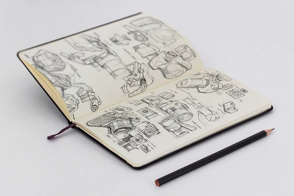 Sketchbook with design of cameras