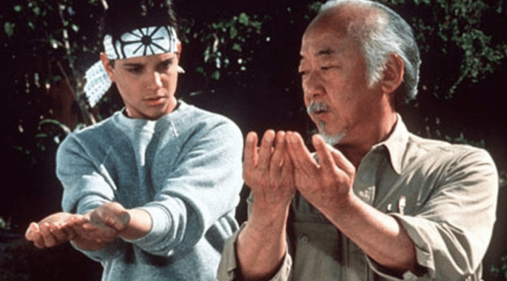 Master Miyagi Karate Kid teaching student the right movements